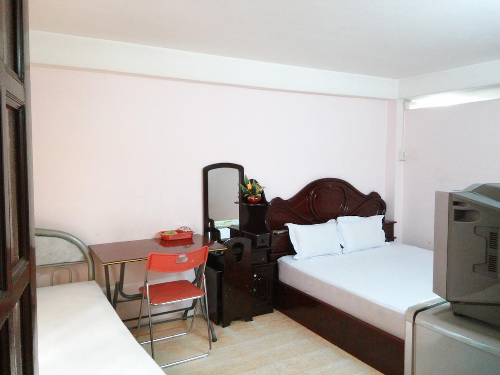 Ngoc Han Hotel Cidade de Ho Chi Minh Quarto foto